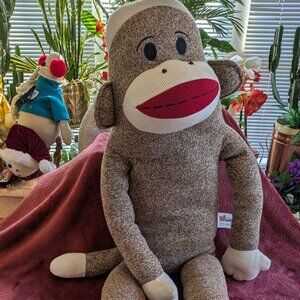 giant stuffed Maxx sock monkey 44 in tall, brn/beige/red